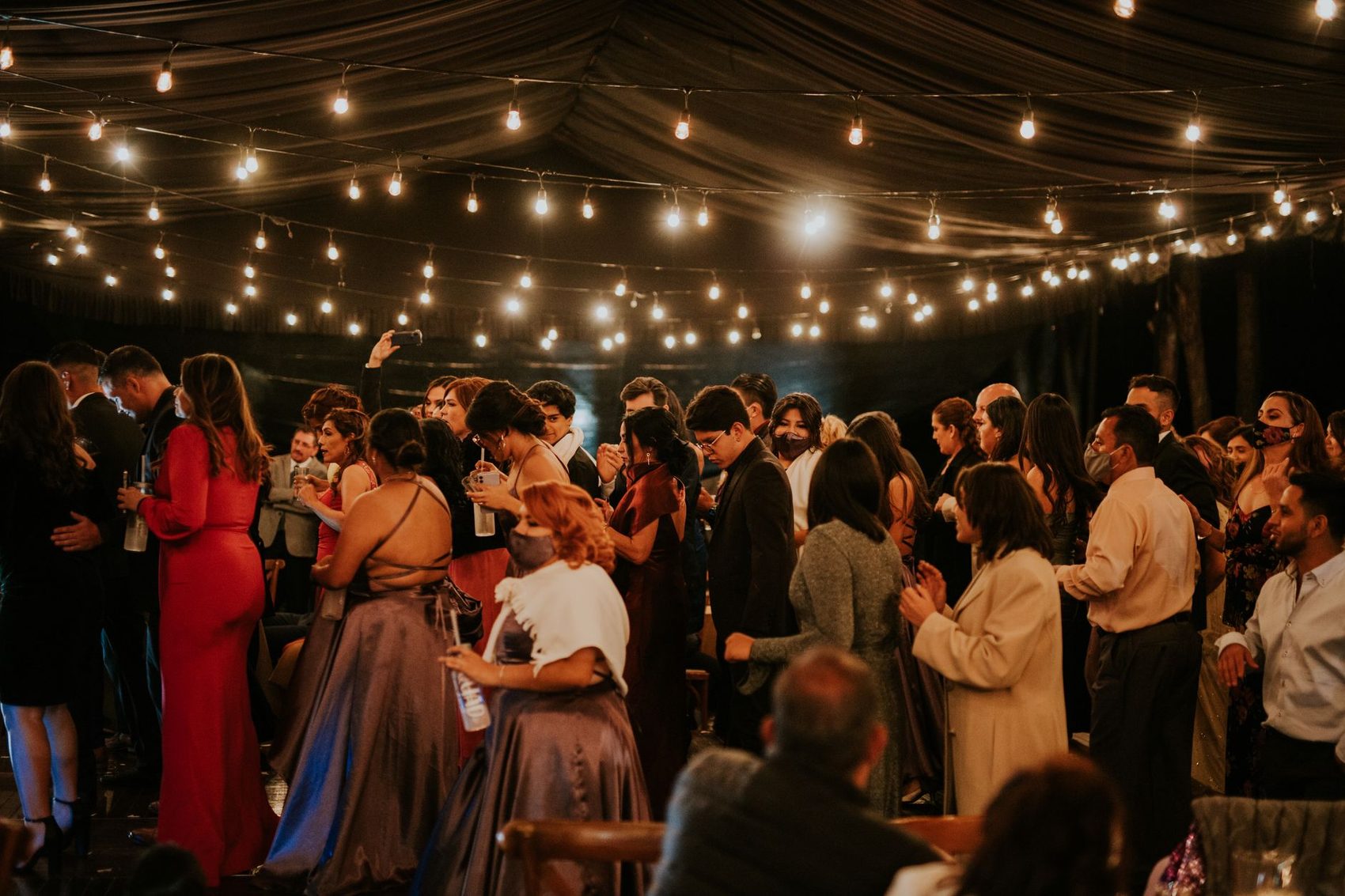 Guests under strung lights